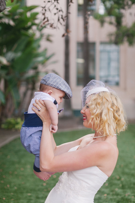 bride holding baby son