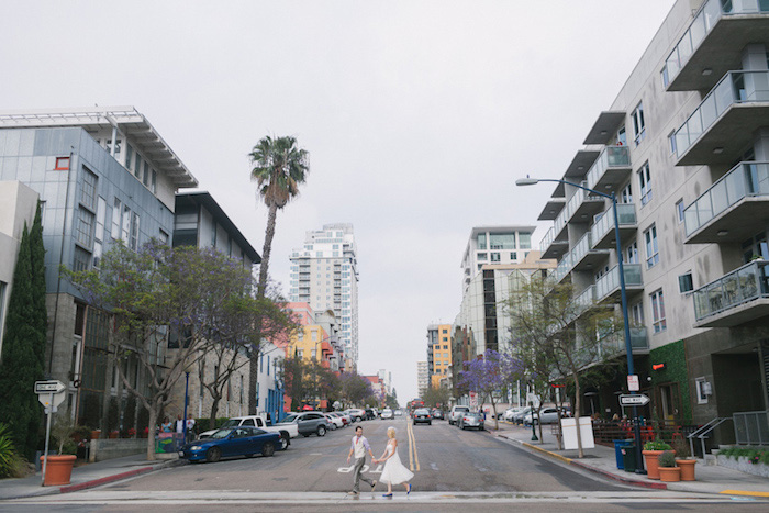 bride and groom crossing street