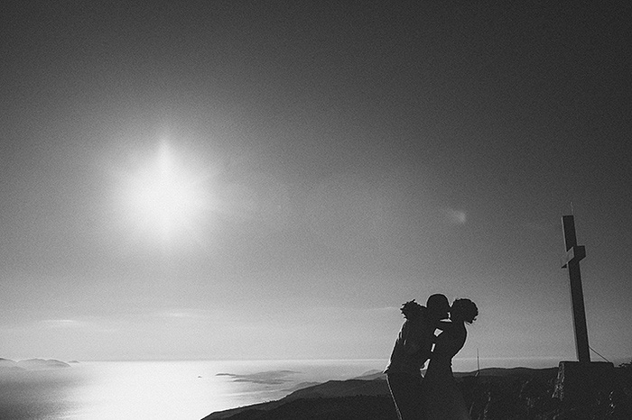 bride and groom kissing in Croatian countryside