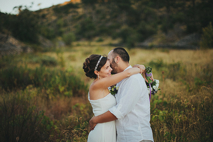 bride and groom  hugging