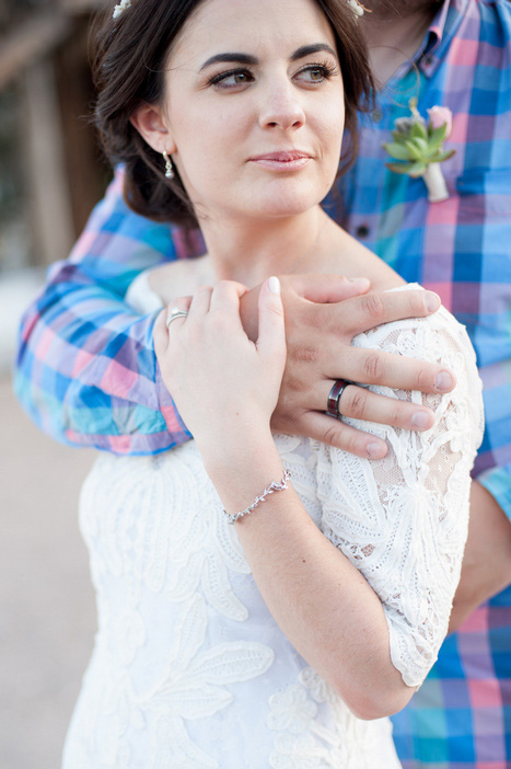 portrait of bride and groom's rings