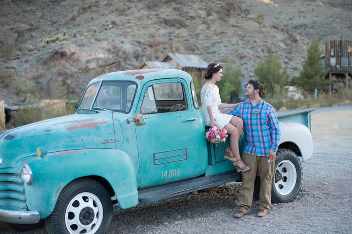 bride and groom portrait with blue vintage pick-up