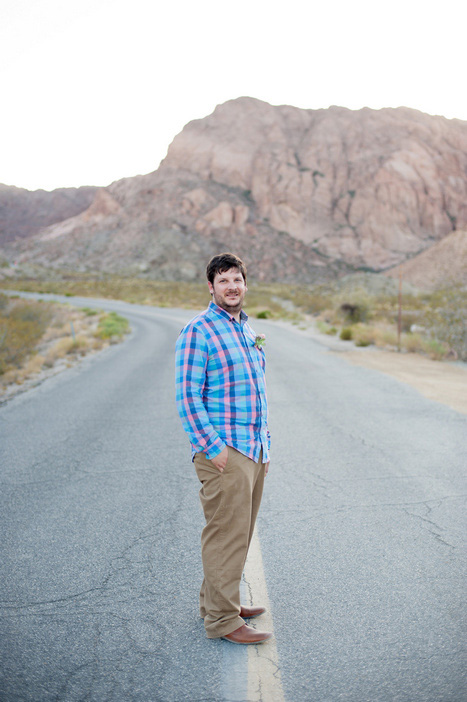 groom in middle of desert highway