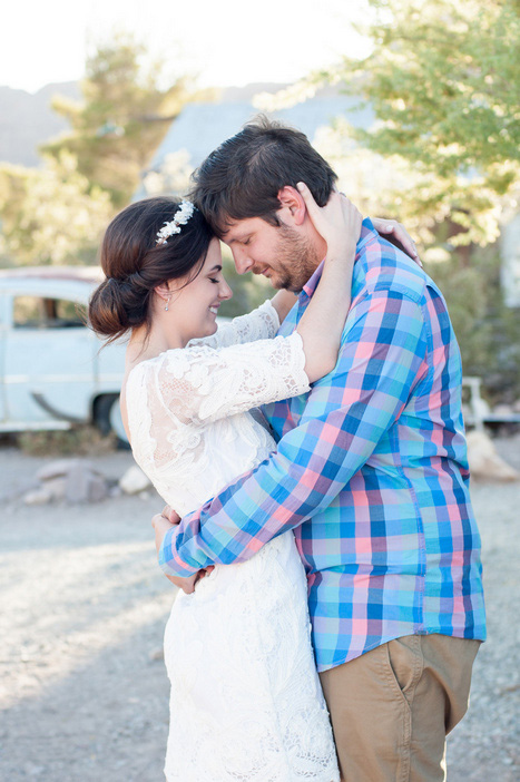 bride and groom embracing