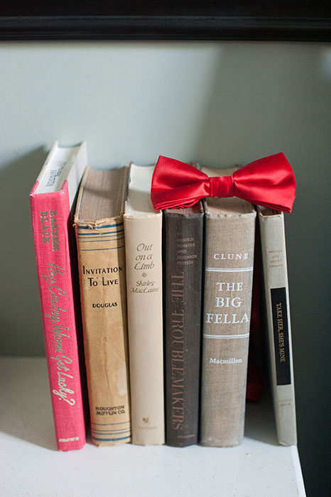 red bow tie on books