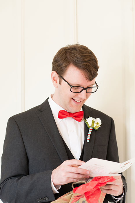 groom reading card