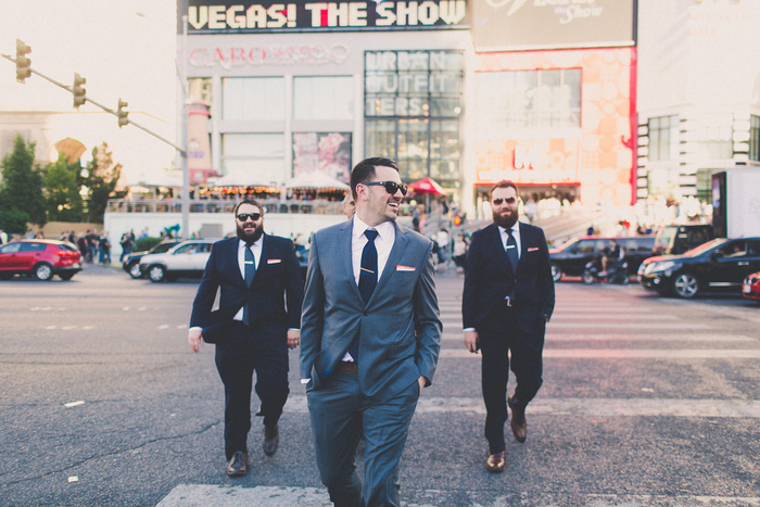 groomsmen walking through Vegas