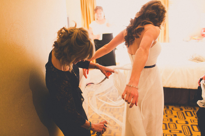 bride adjusting dress