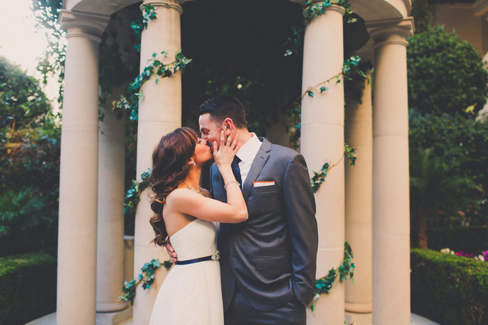 Bride and groom kissing