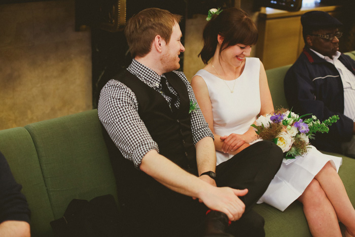 bride and groom waiting at New York City Hall