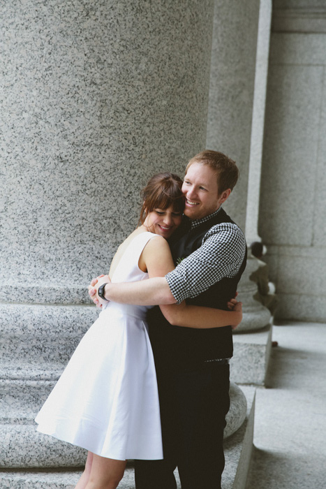 bride and groom hugging