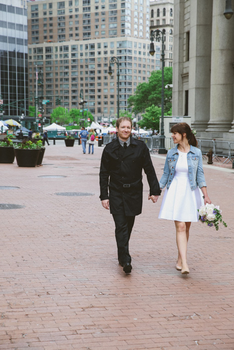 bride and groom strolling through New York