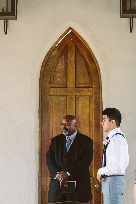 groom waiting at the altar