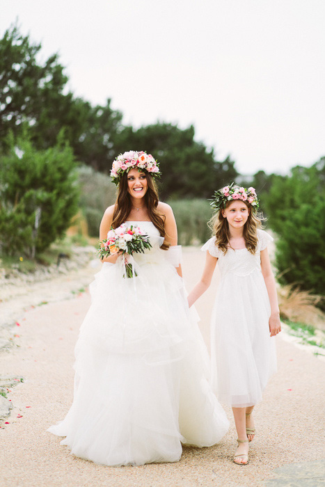 bride walking with flower girl