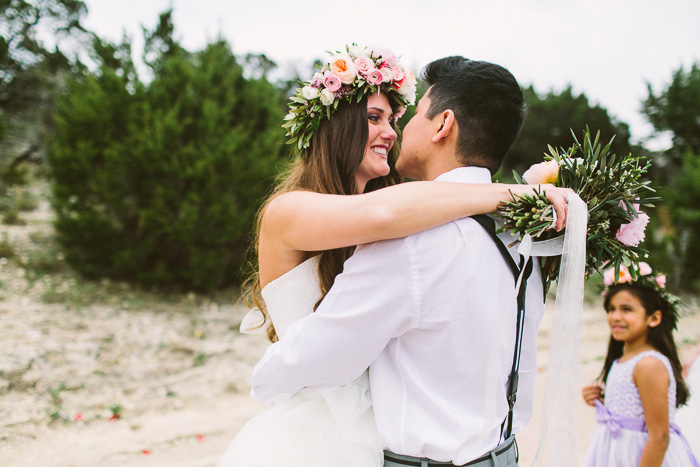 bride and groom embracing