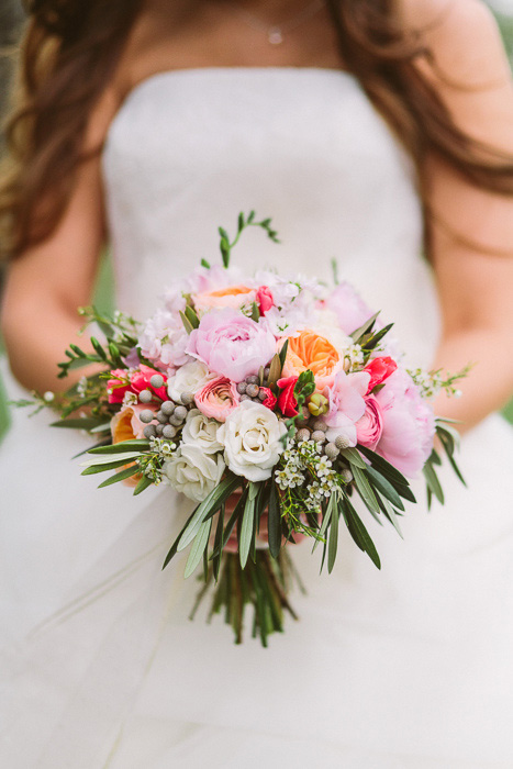 bride with pink garden rose bouquet