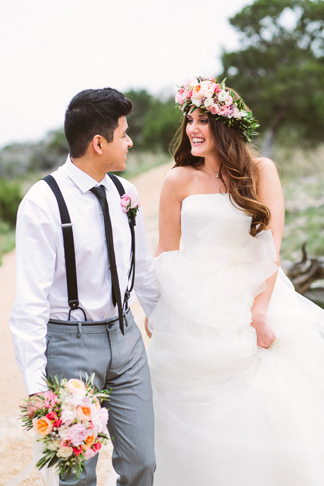 bride and groom walking hand in hand