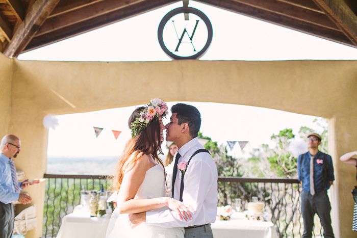 bride and groom kissing during reception