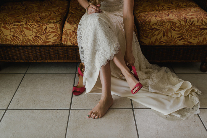 bride putting on shoes