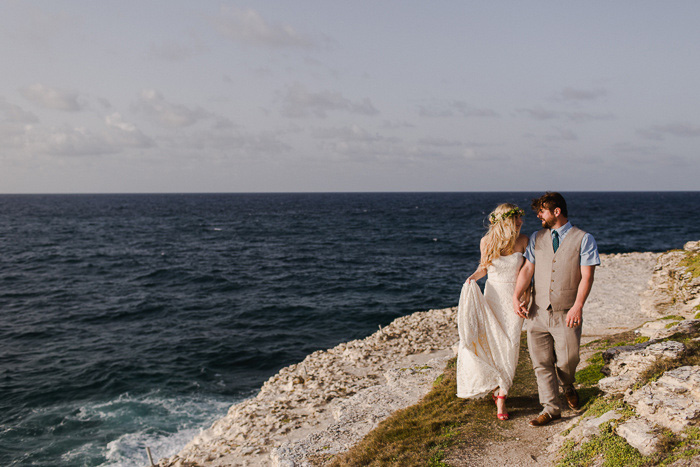 bride and groom by the ocean