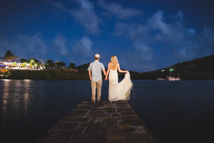 Bride and groom on dock in Antigua