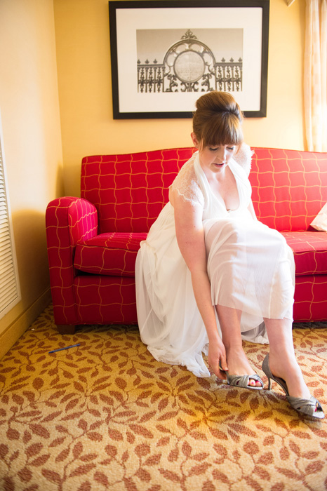 bride putting on shoes