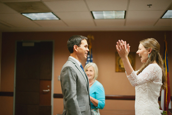 excited bride at courthouse ceremony