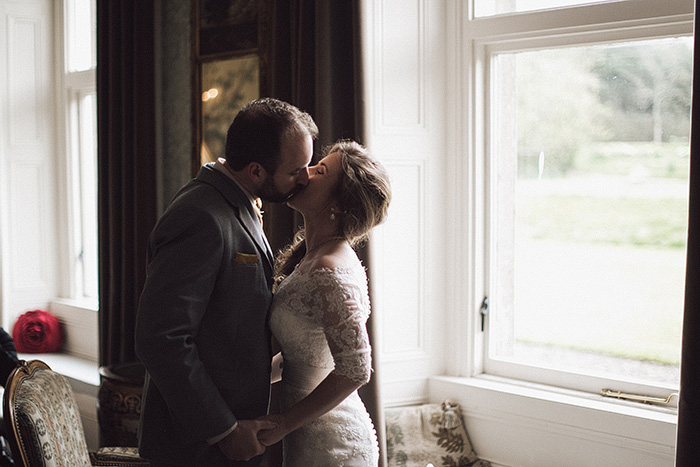 bride and groom kissing