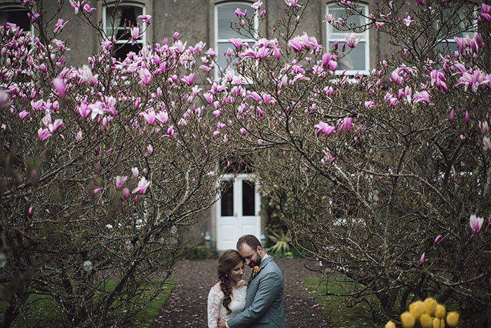 bride and groom outside irish inn