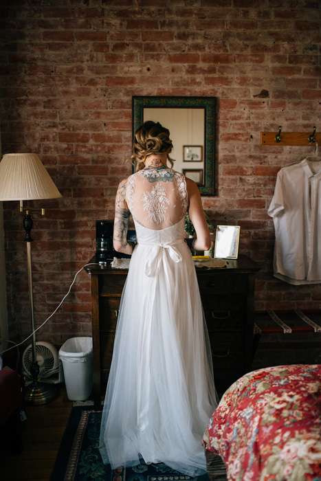 bride in lace backed dress