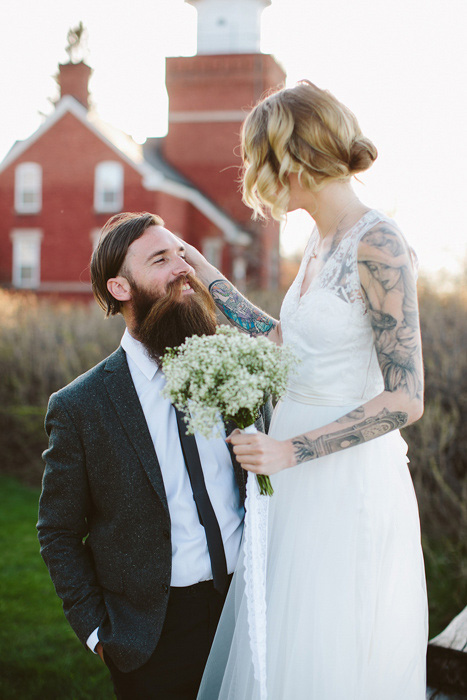 bride fixing groom's hair