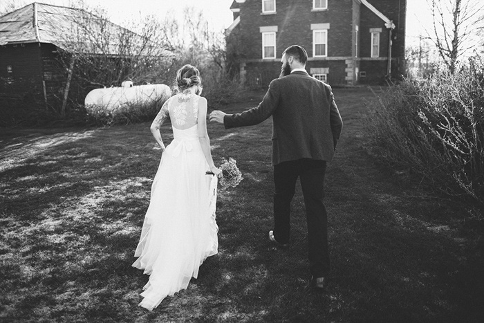 bride and groom walking away