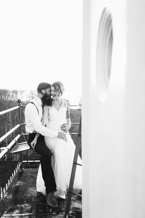 bride and groom lighthouse portrait