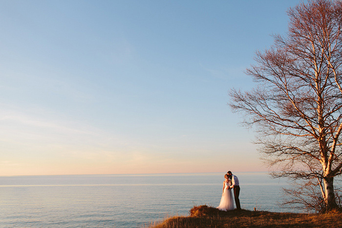 bride and groom portrait by the lake