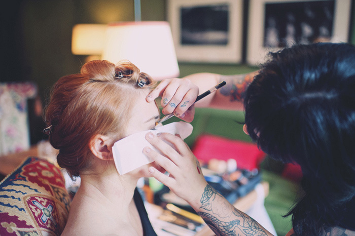 bride getting her make-up done