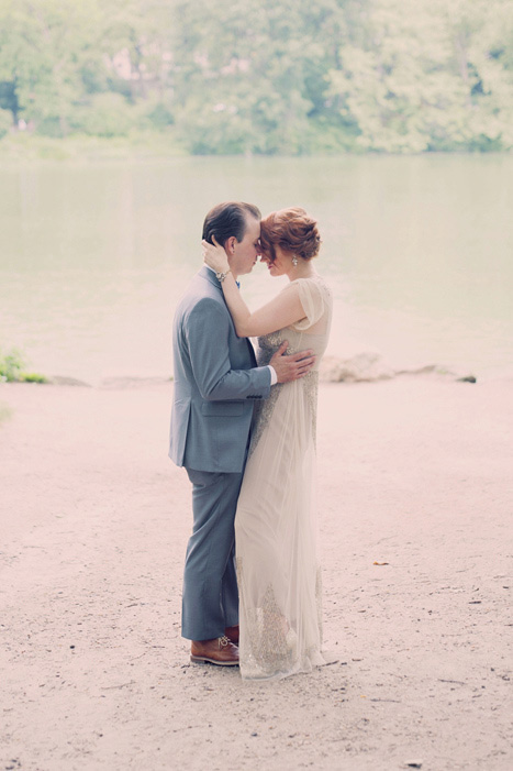 bride and groom by lake in Central Park