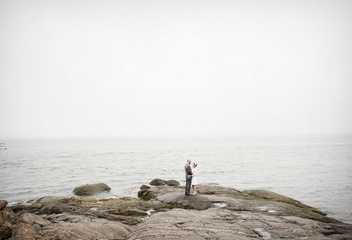 bride and groom by the lake