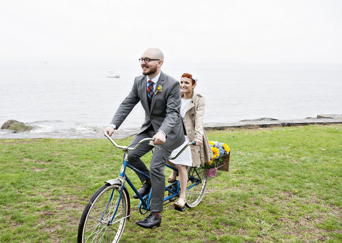 brie and groom riding tandem bike