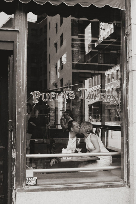 bride and groom in pub window