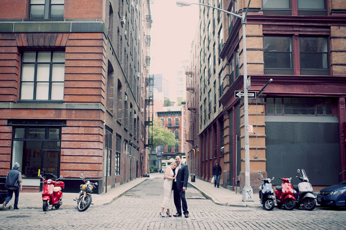 bride and groom kissing in New York street