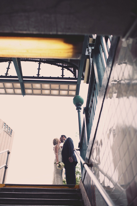 bride and groom outside subway entrance