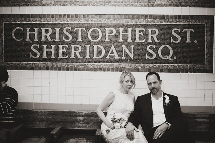 bride and groom in subway station