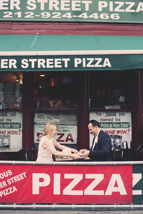 bride and groom at pizzeria