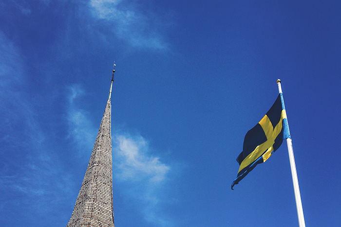 church steeple and swedish flag