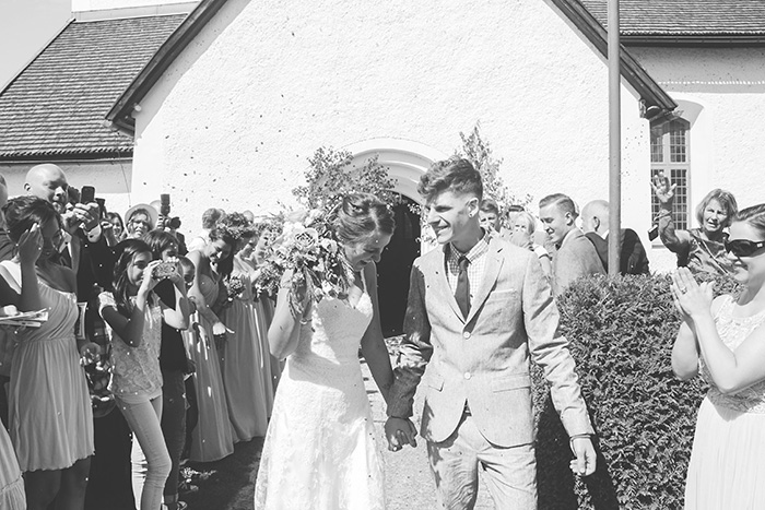 bride and groom exiting the church