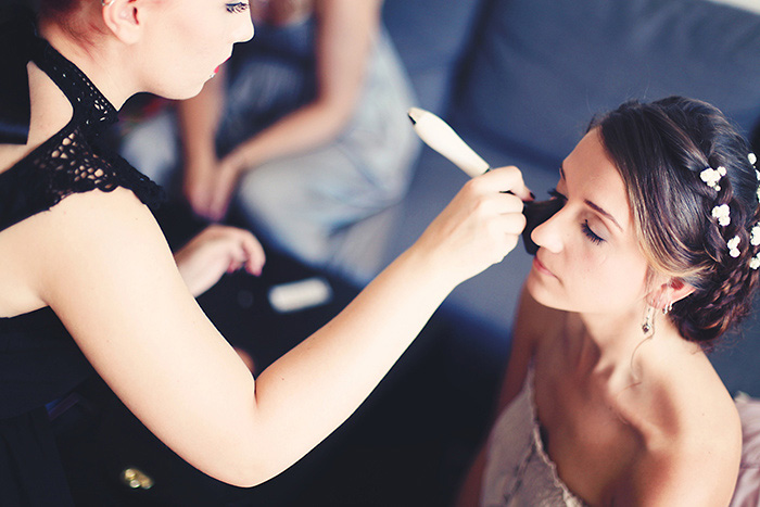 bride getting her make-up done