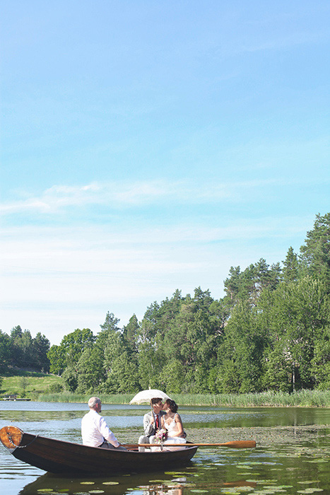 bride and groom in row boat