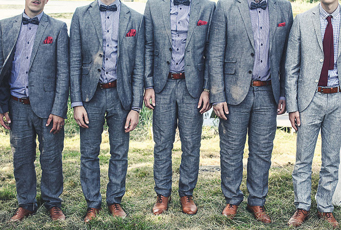 groomsmen in grey suits