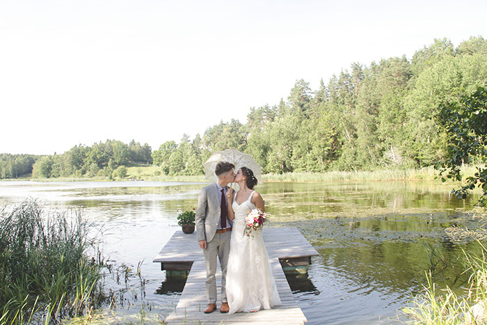 bride and groom on dock