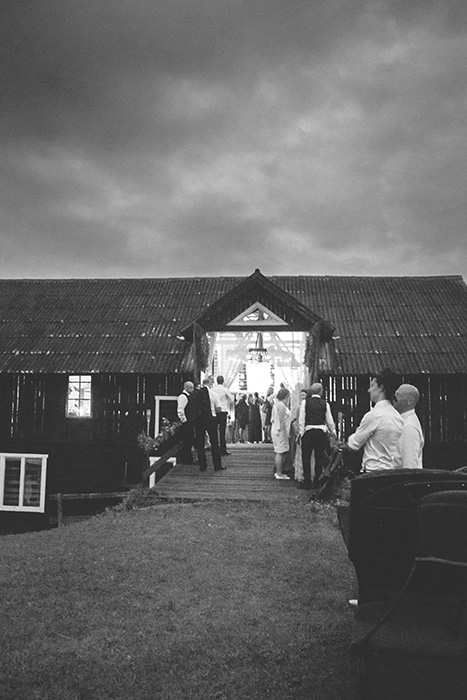 barn lit up for wedding reception